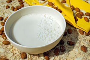 Goat milk for puppies in a bowl supporting digestion and healthy growth